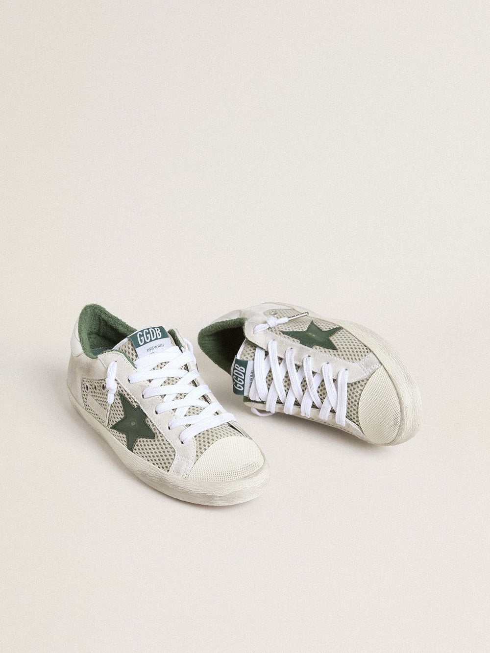 Women’s Super-Star LTD in white suede and mesh with green leather star and silver foiled leather heel tab