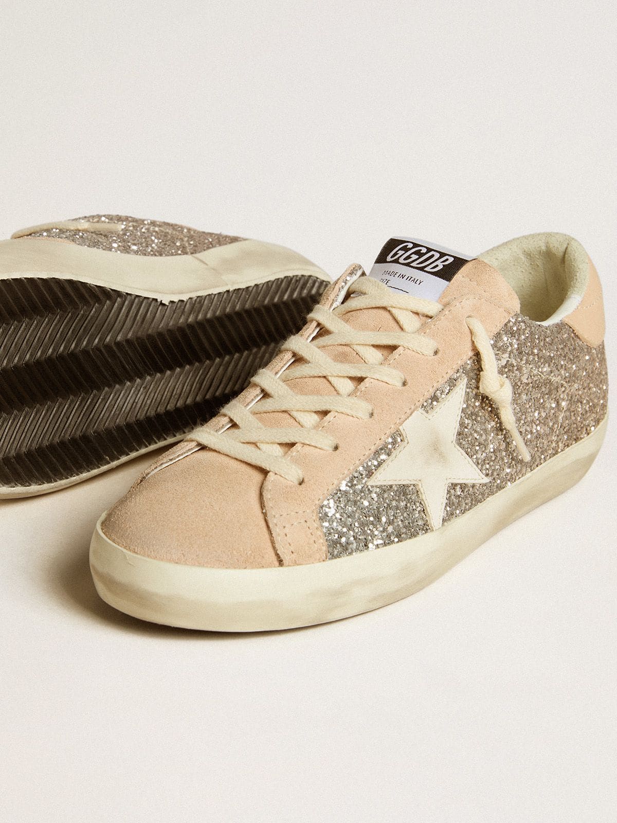 Women’s Super-Star in silver glitter with leather star and heel tab