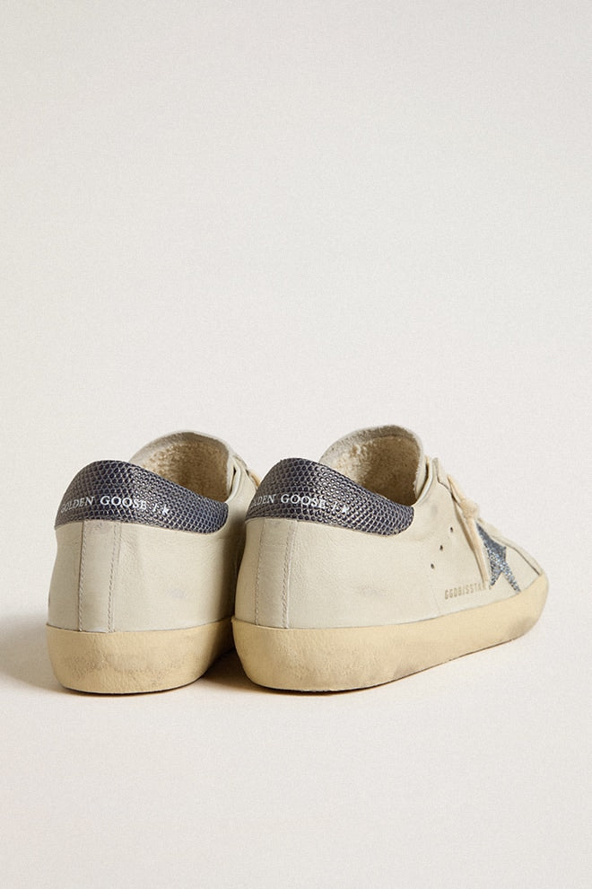 Super-Star with cream-colored leather star with Swarovski crystals and blue leather heel tab with lizard print