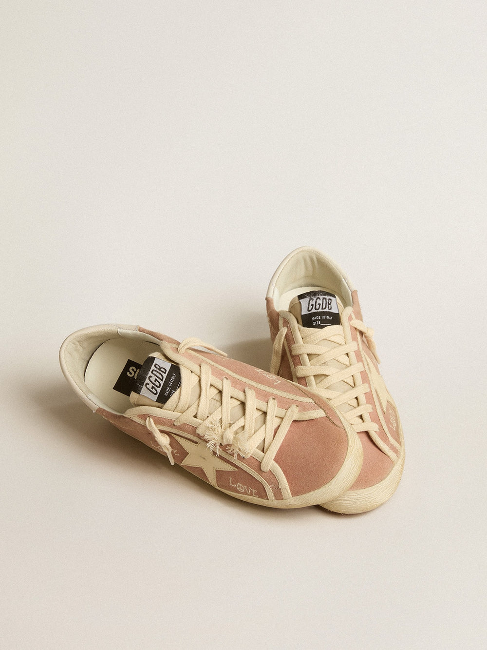 Women's Super-Star in powder-pink suede with cream leather star