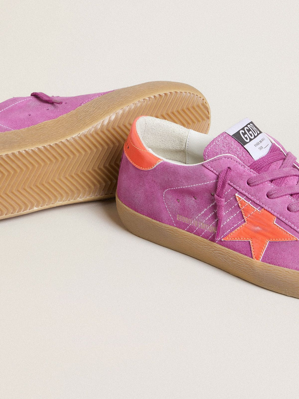Women's Super-Star in fuchsia suede with fluorescent orange laminated leather star and heel tab