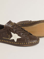 Women’s Super-Star LTD in dark brown leather with cream suede star and studs