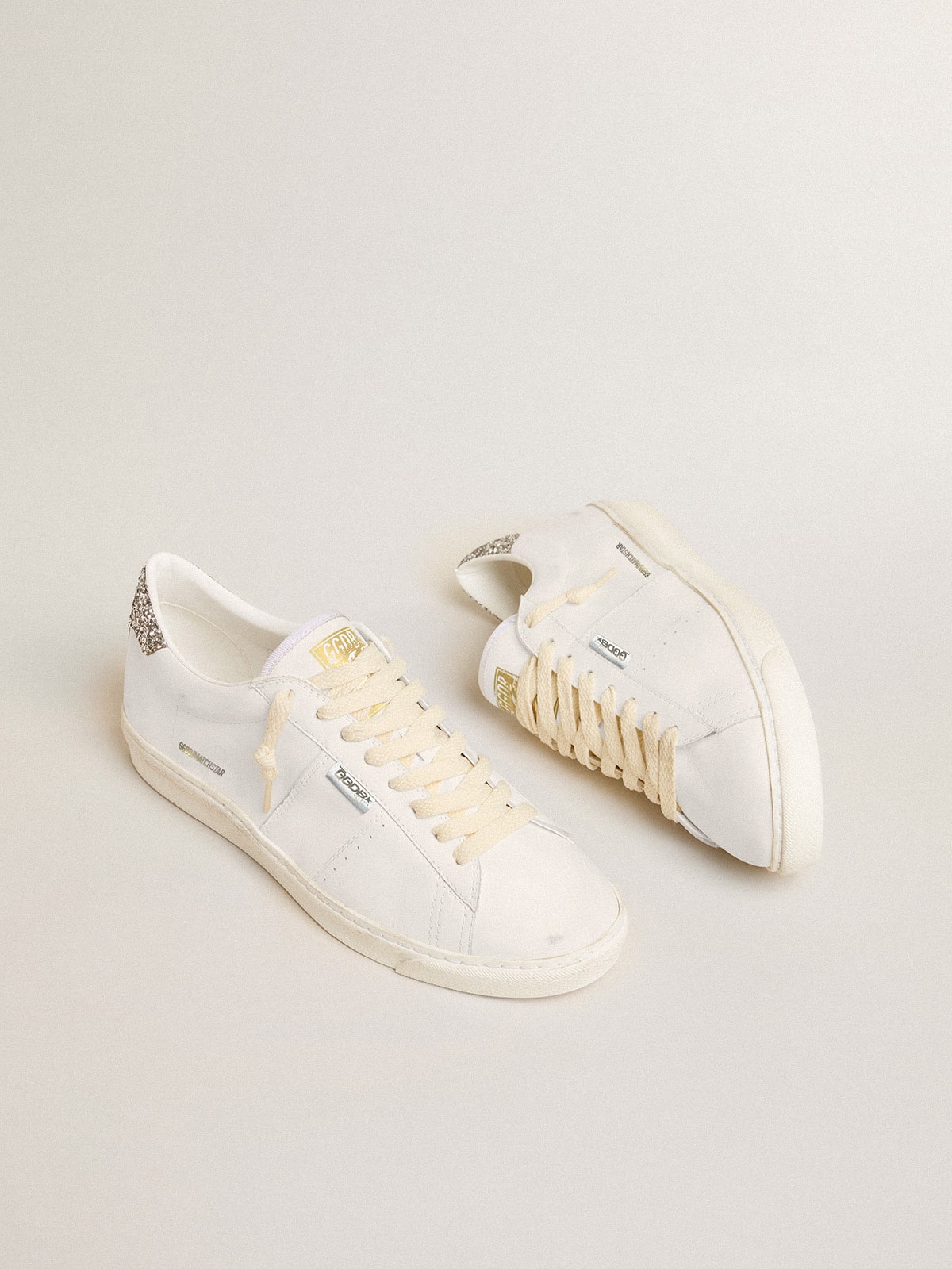 Matchstar in white leather with silver glitter heel tab
