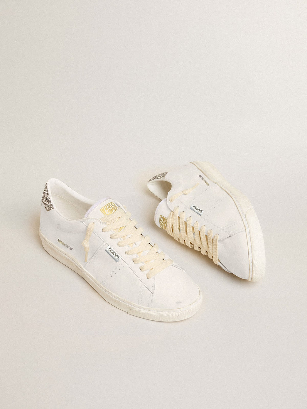 Matchstar in white leather with silver glitter heel tab