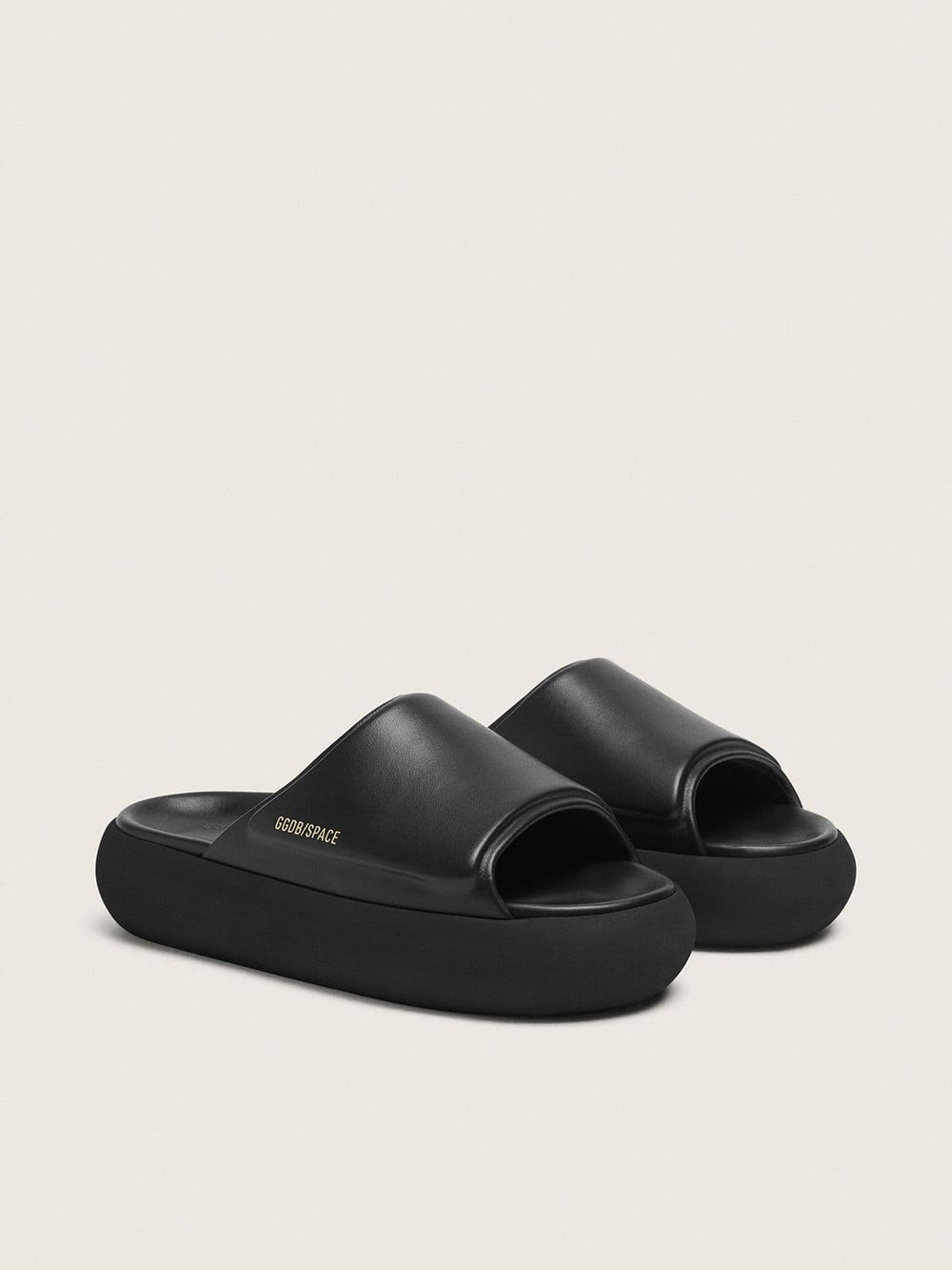 Women's Space-Star slip-ons in black leather