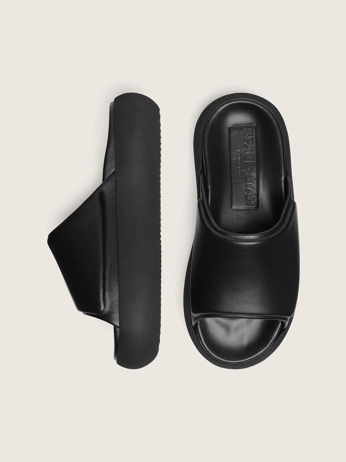 Women's Space-Star slip-ons in black leather