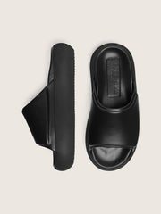 Women's Space-Star slip-ons in black leather