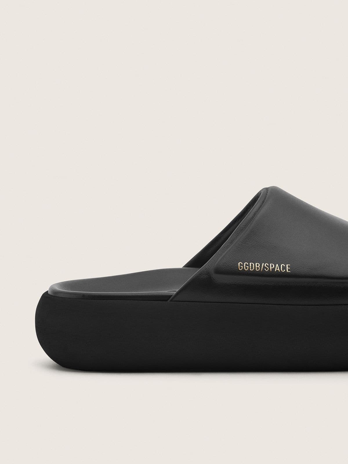 Women's Space-Star slip-ons in black leather