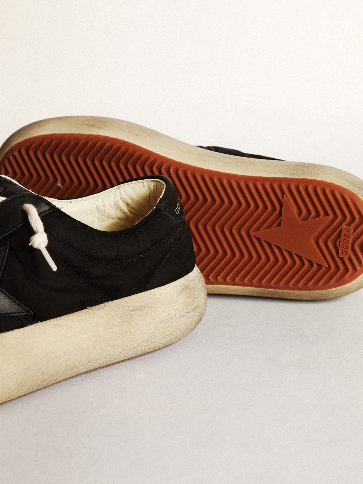 Women's Space-Star shoes in black nylon with black leather star and heel tab