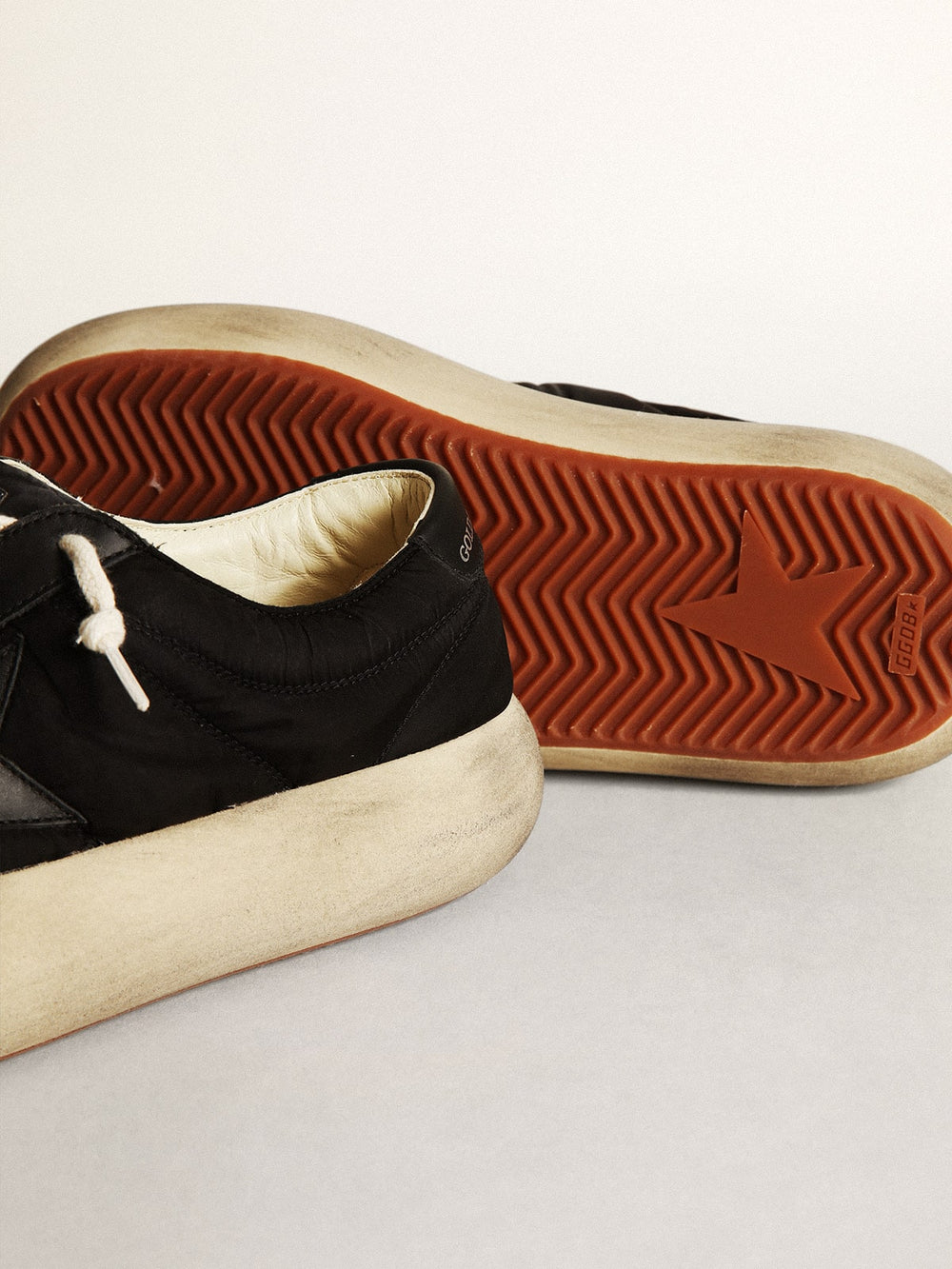 Women's Space-Star shoes in black nylon with black leather star and heel tab