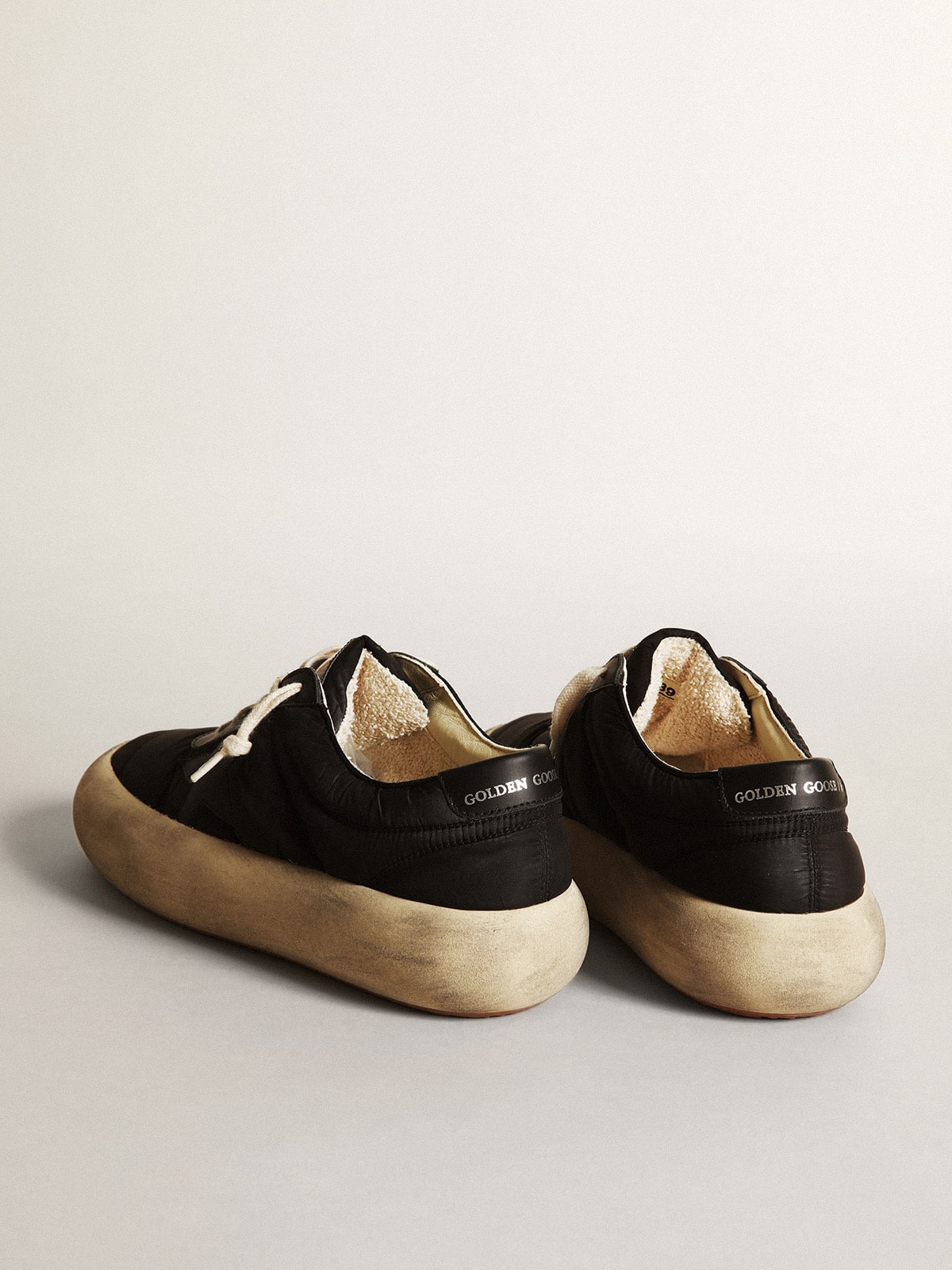 Women's Space-Star shoes in black nylon with black leather star and heel tab