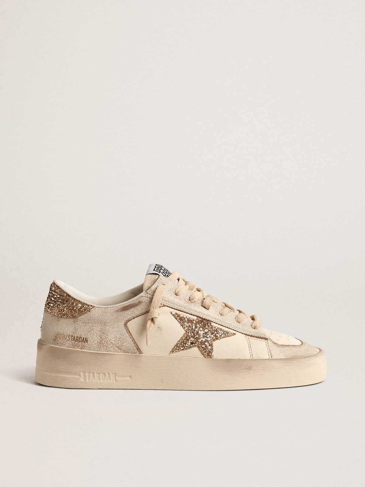 Women’s Stardan in ecru nappa leather with gold glitter star and heel tab