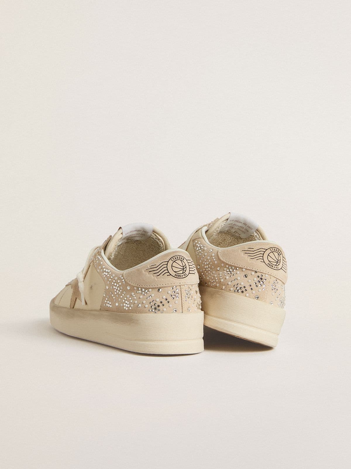 Stardan in cream-colored suede and leather with Swarovski and a suede star
