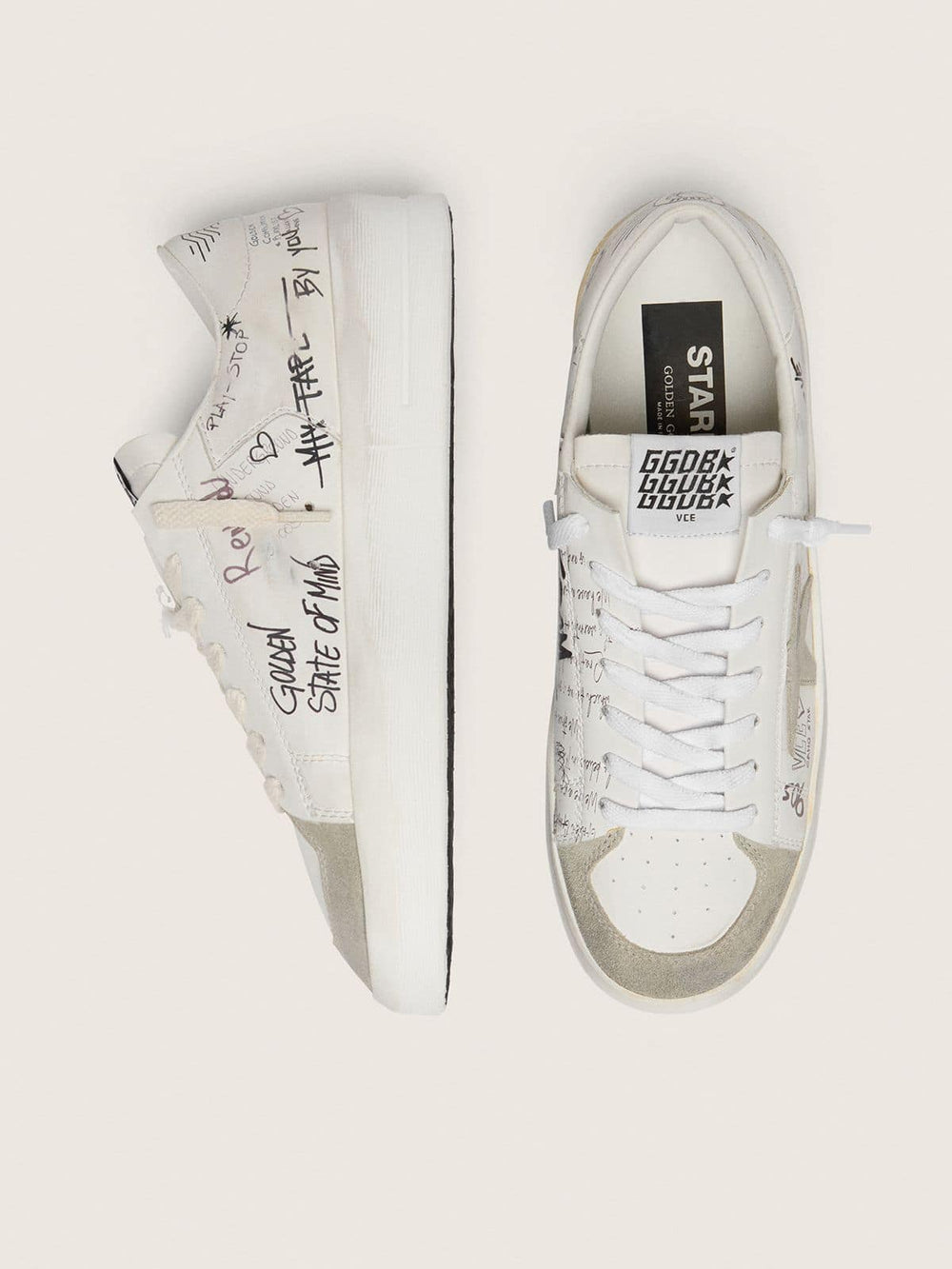 Stardan with beige suede star and toe and all-over lettering and patterns