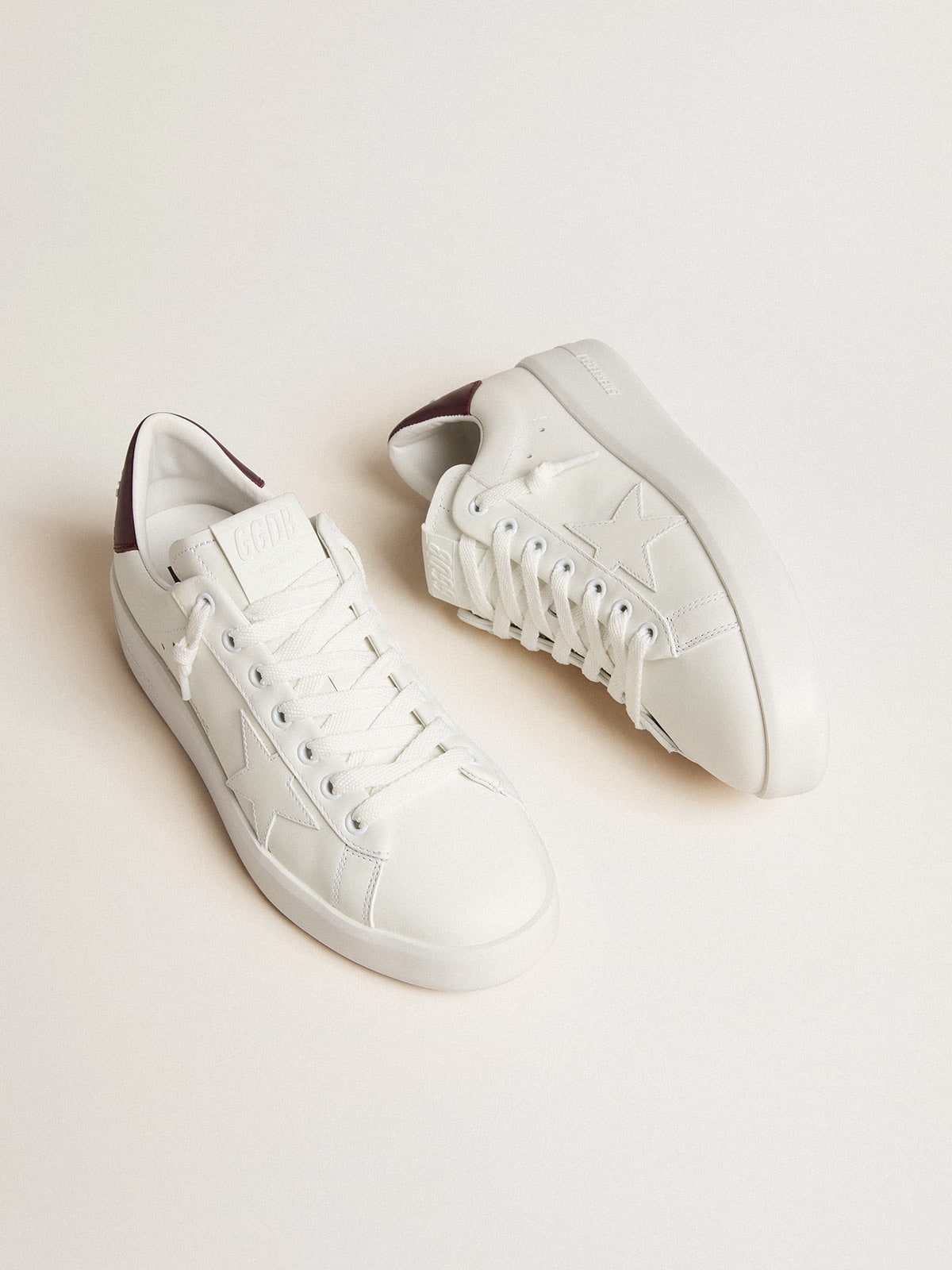 Purestar with white leather star and plum leather heel tab