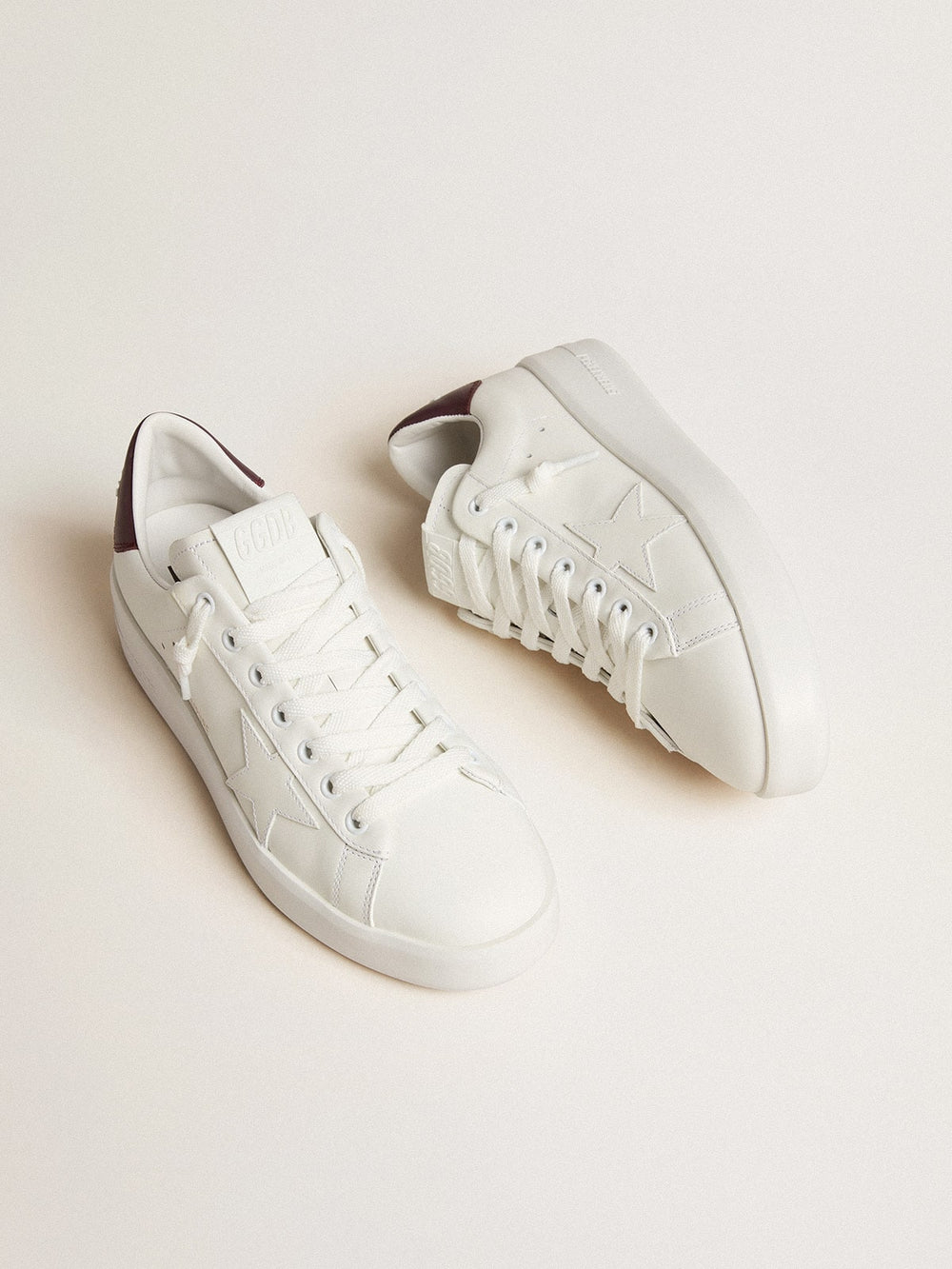 Purestar with white leather star and plum leather heel tab