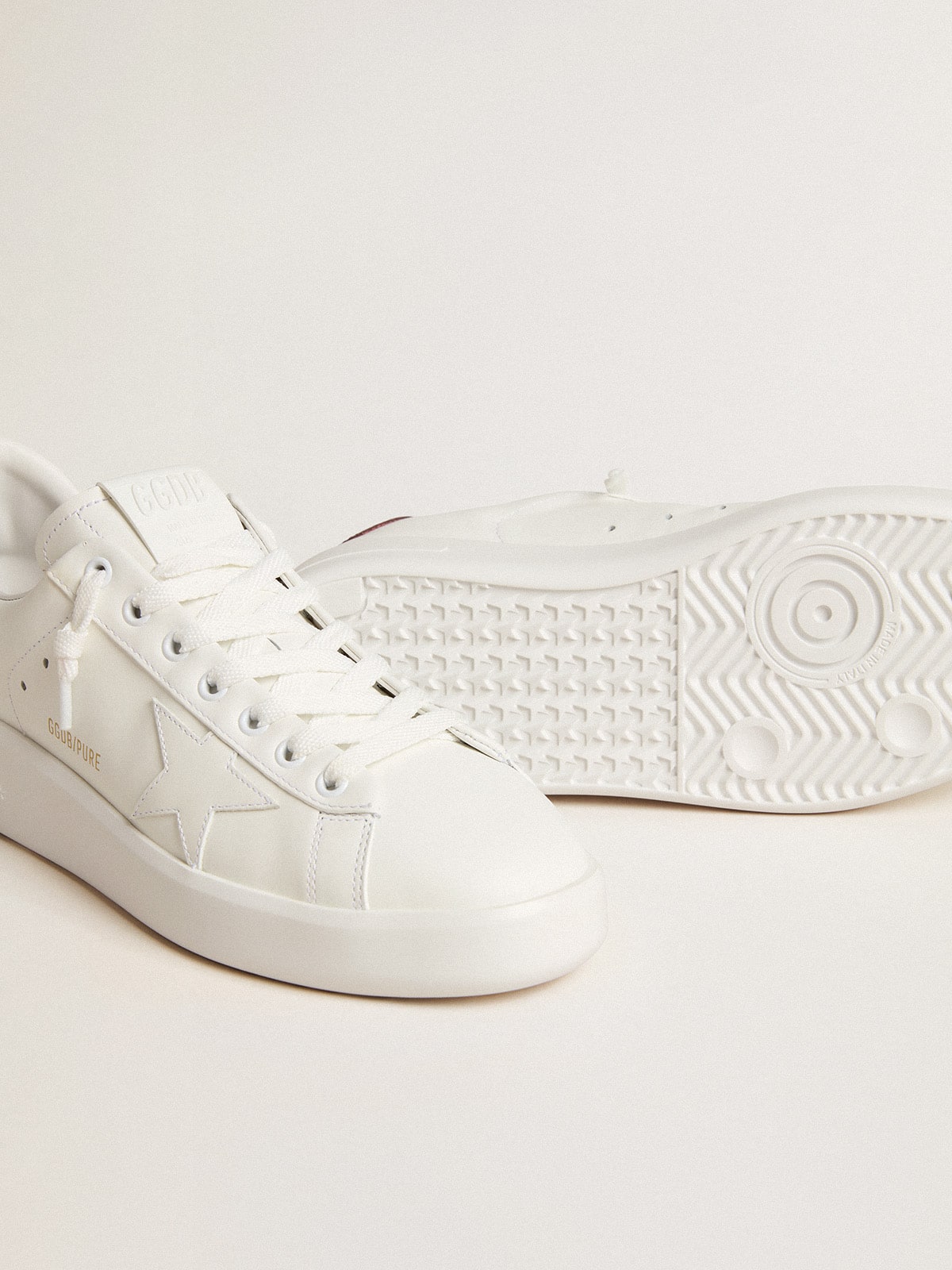 Purestar with white leather star and plum leather heel tab