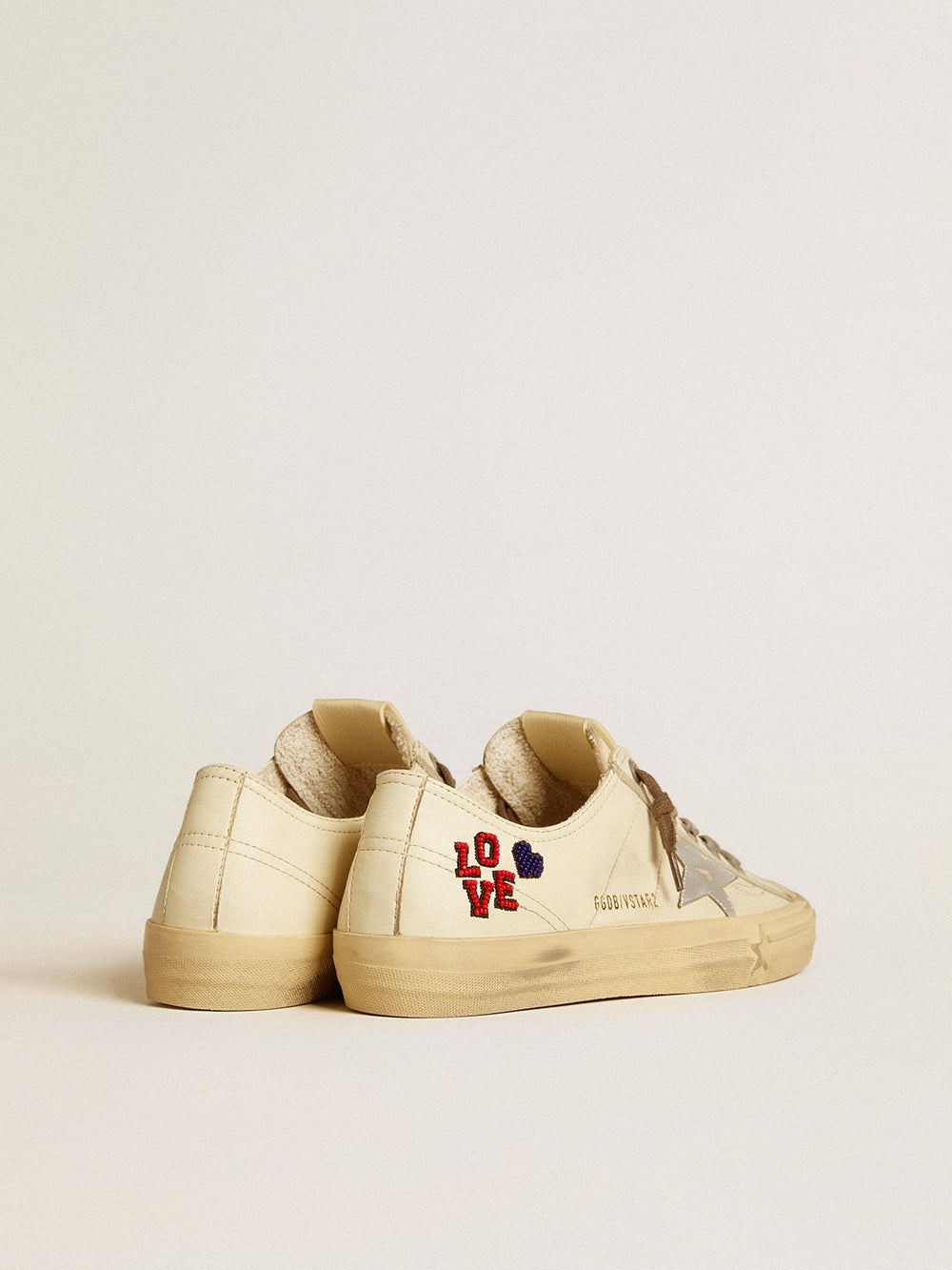 V-Star in ecru nappa with silver nappa star and beaded embroidery