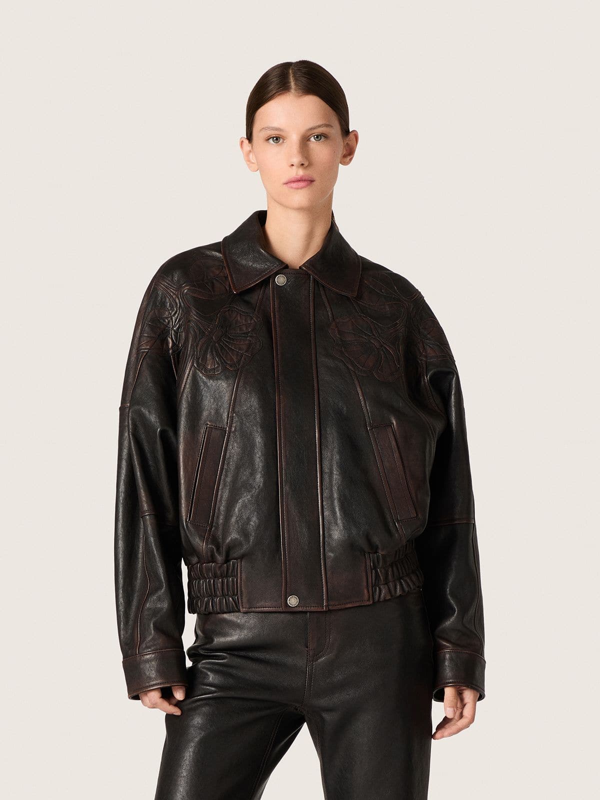 Women's bomber jacket in dark burgundy nappa leather with floral embroidery