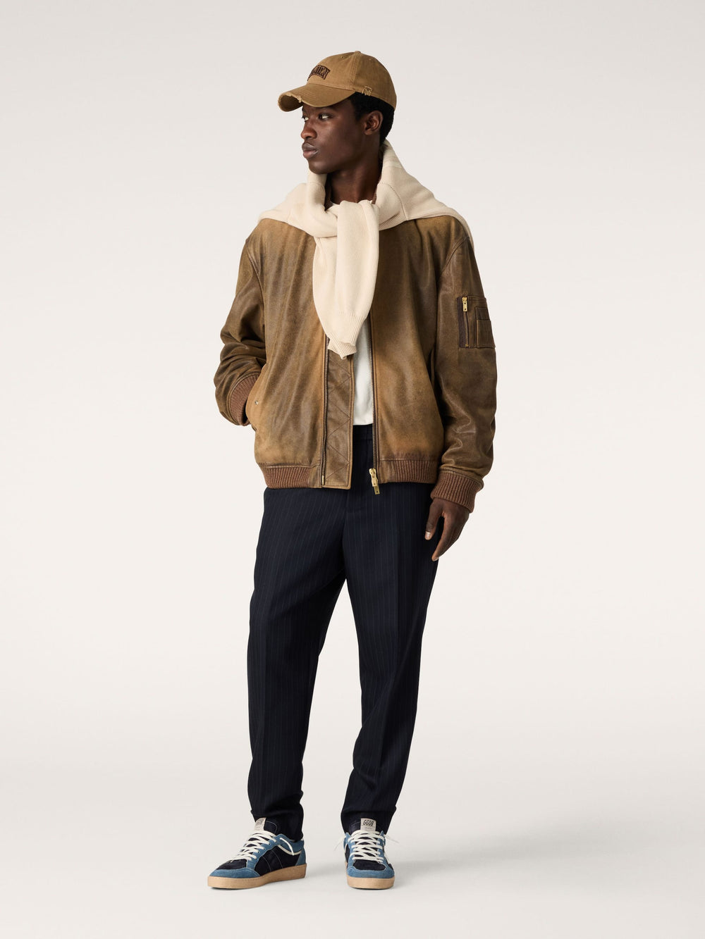 Brown leather biker jacket with a lived-in effect