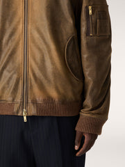 Brown leather biker jacket with a lived-in effect