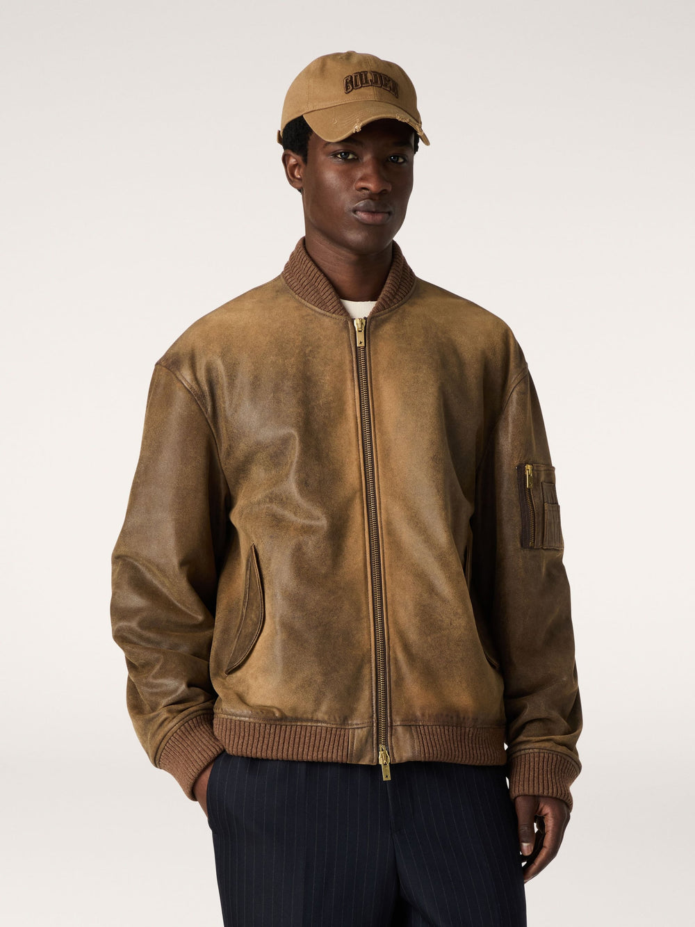 Brown leather biker jacket with a lived-in effect