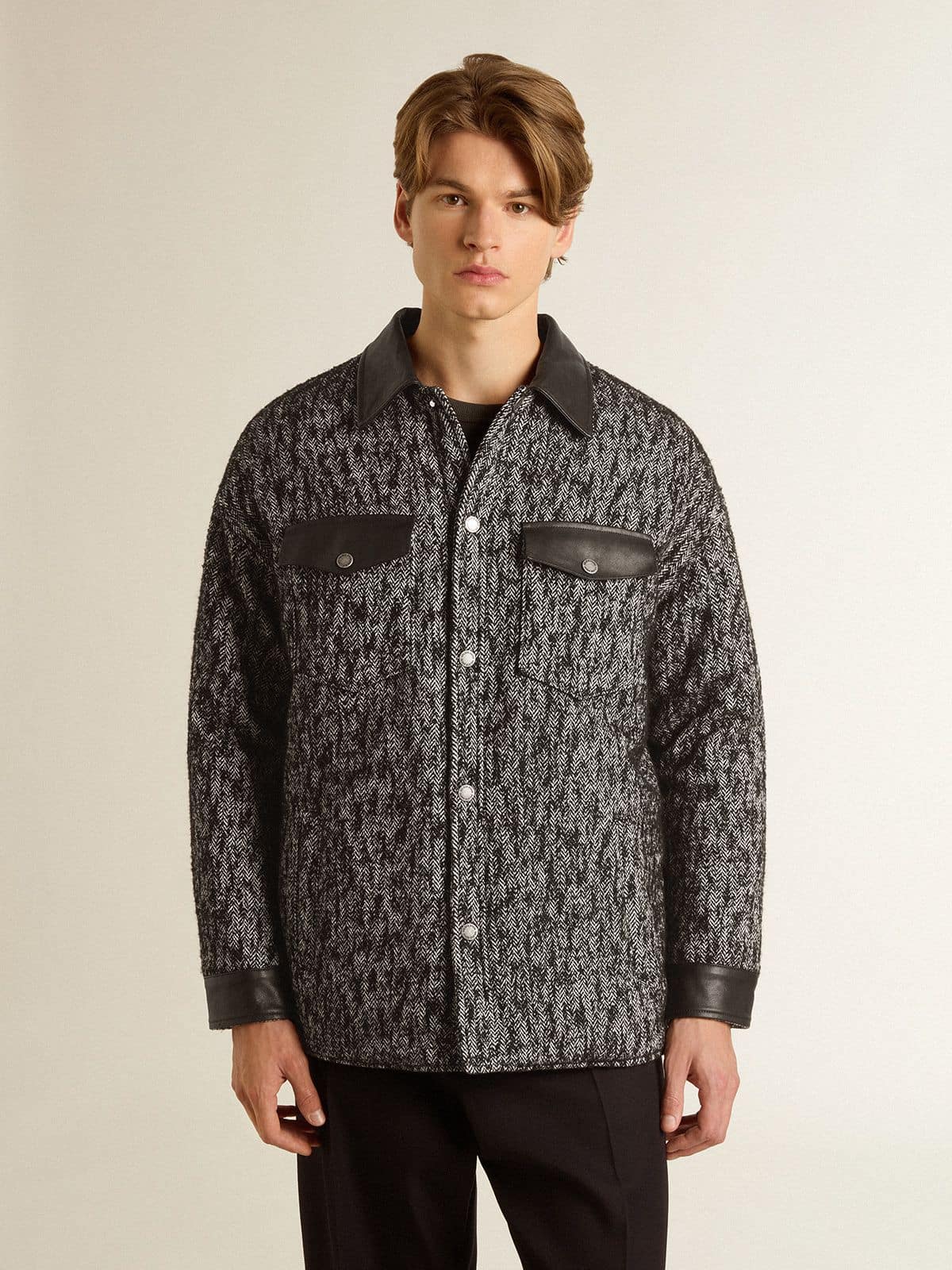 Gray herringbone jacket with black leather details