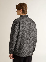 Gray herringbone jacket with black leather details