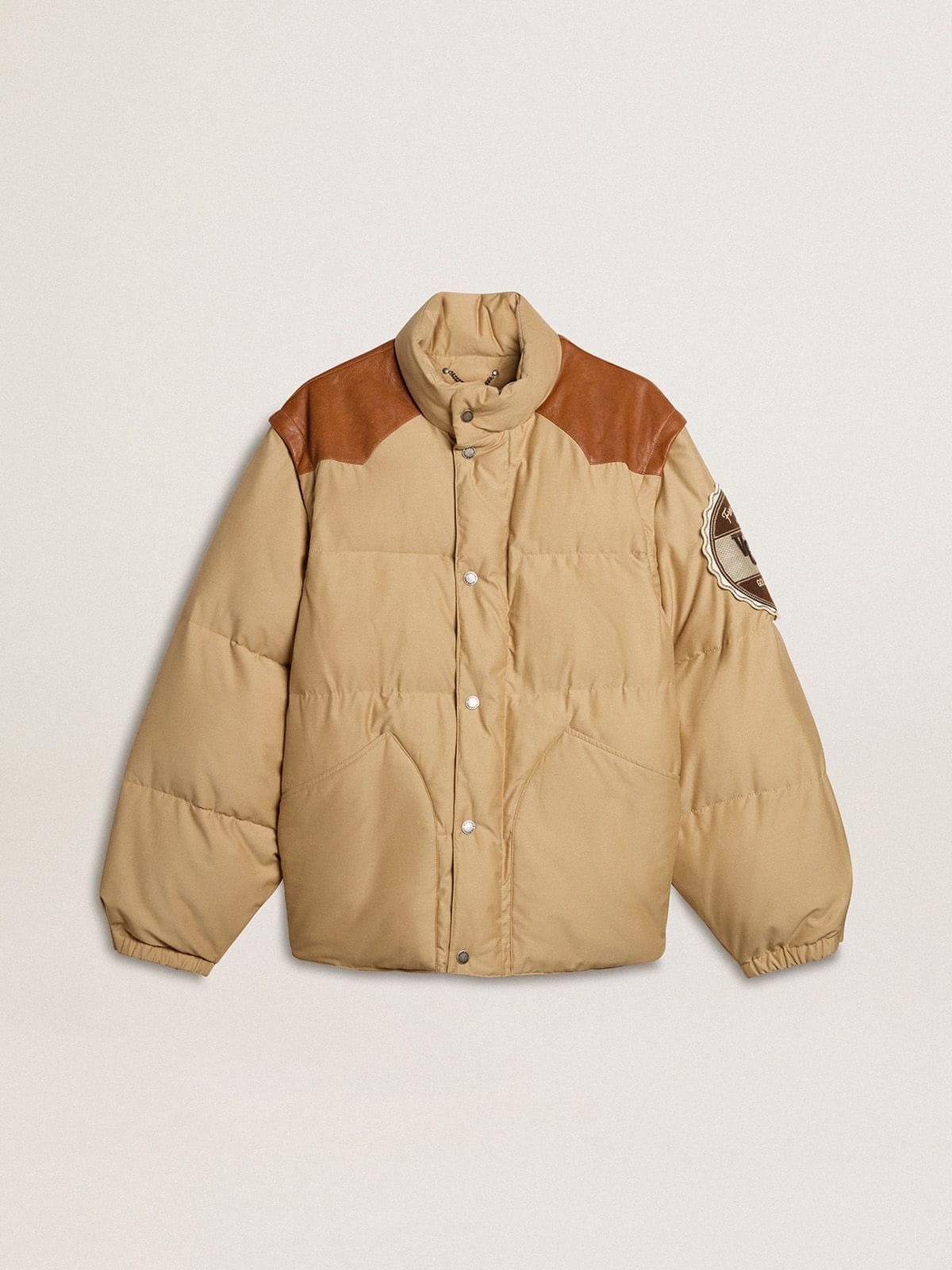 Beige bomber jacket with leather and patch details