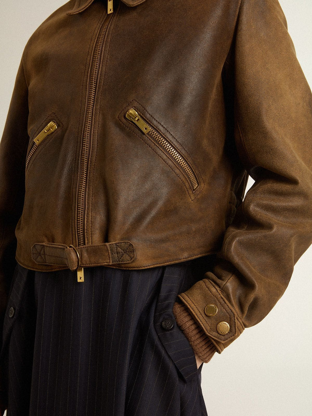 Women’s cropped brown leather biker jacket with zip