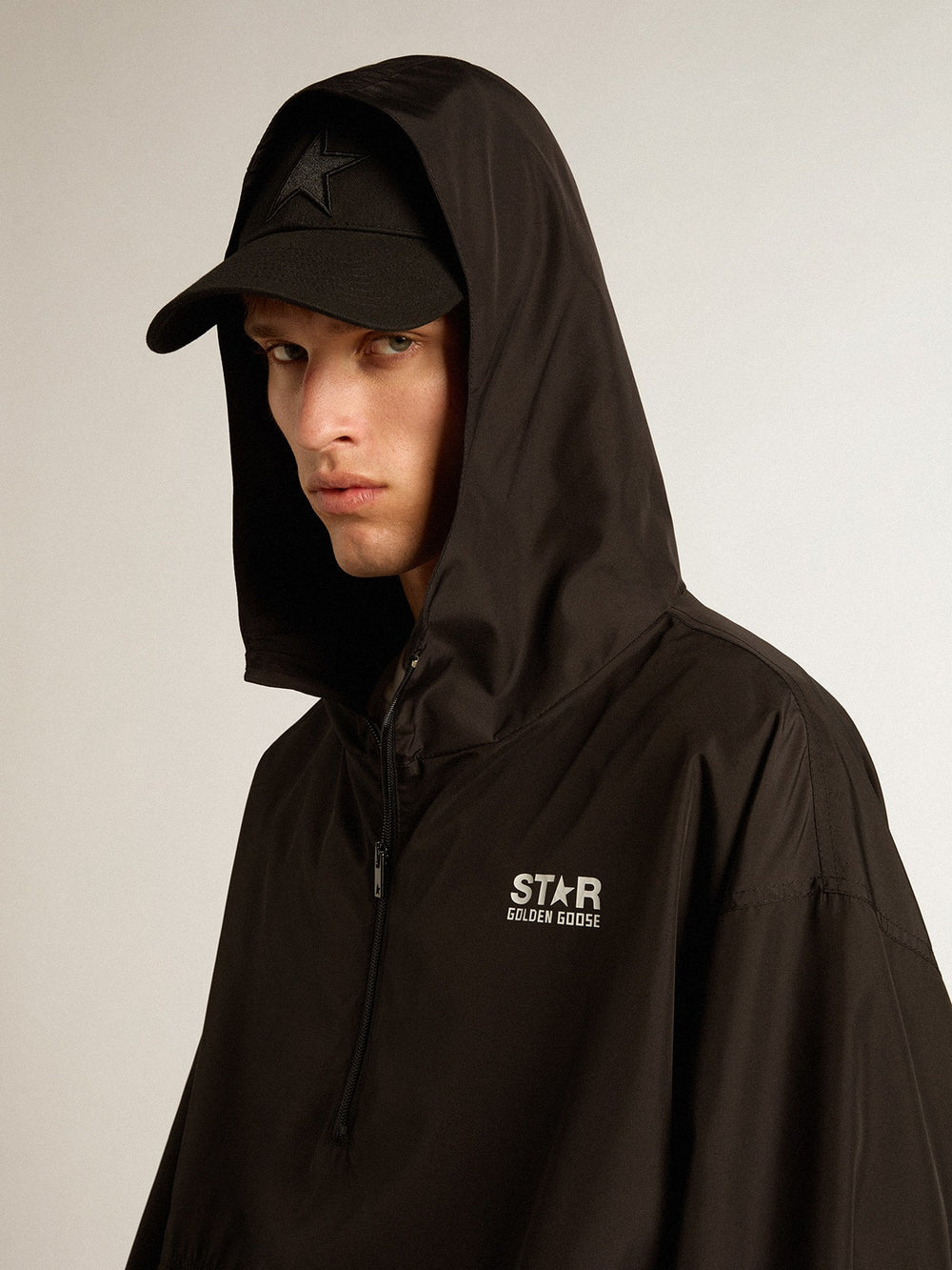 Black windbreaker with hood