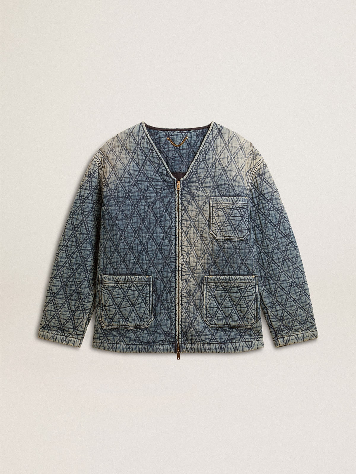 Women's blue quilted jacket in cotton denim with distressed finish