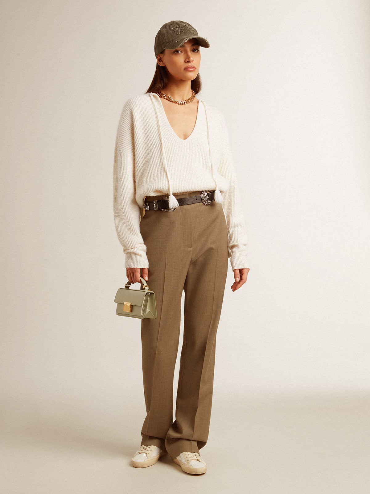 Ribbed wool sweater with V neck and drawstring with tassels