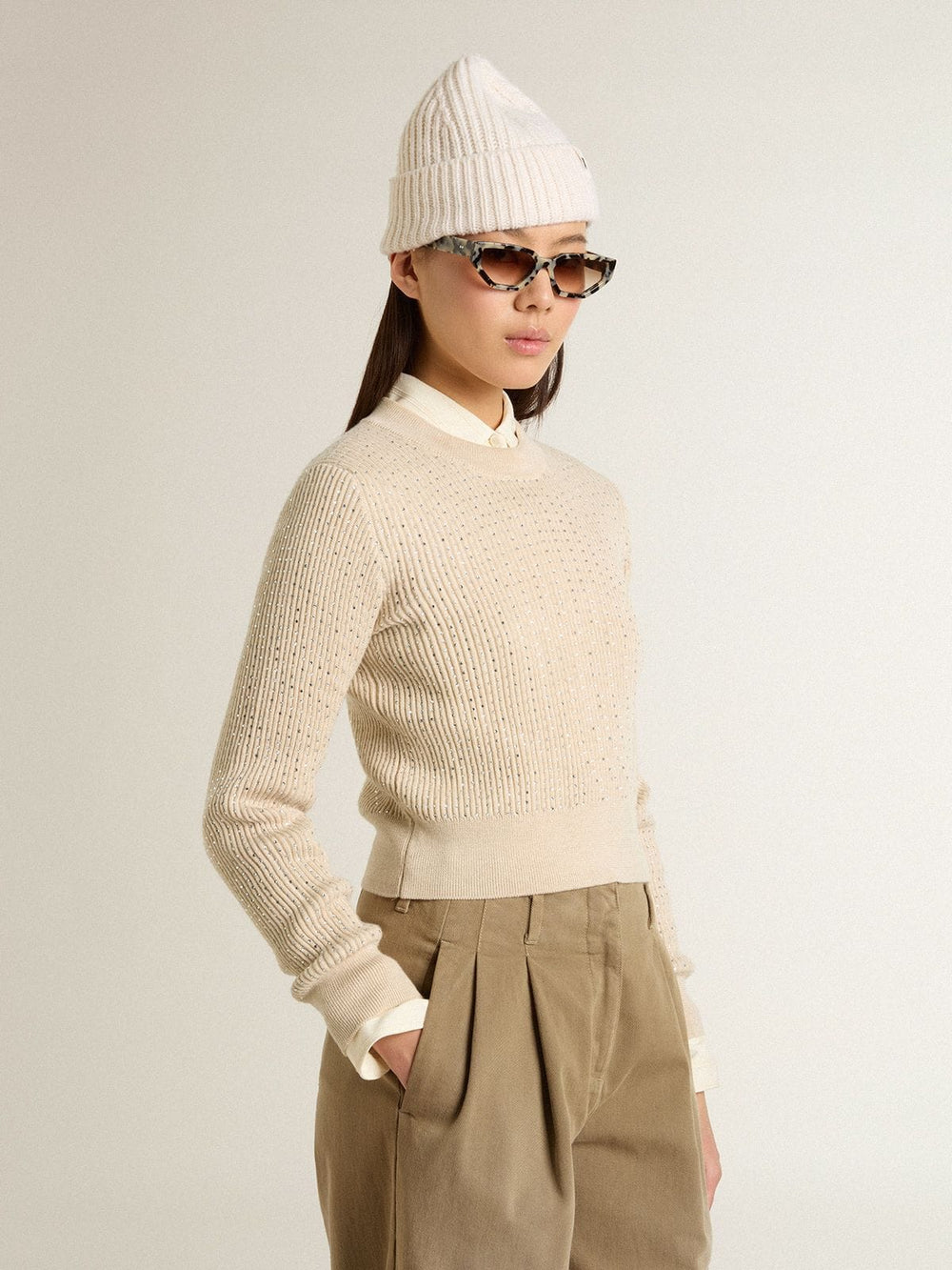 Cropped round-neck sweater in beige wool with all-over crystals