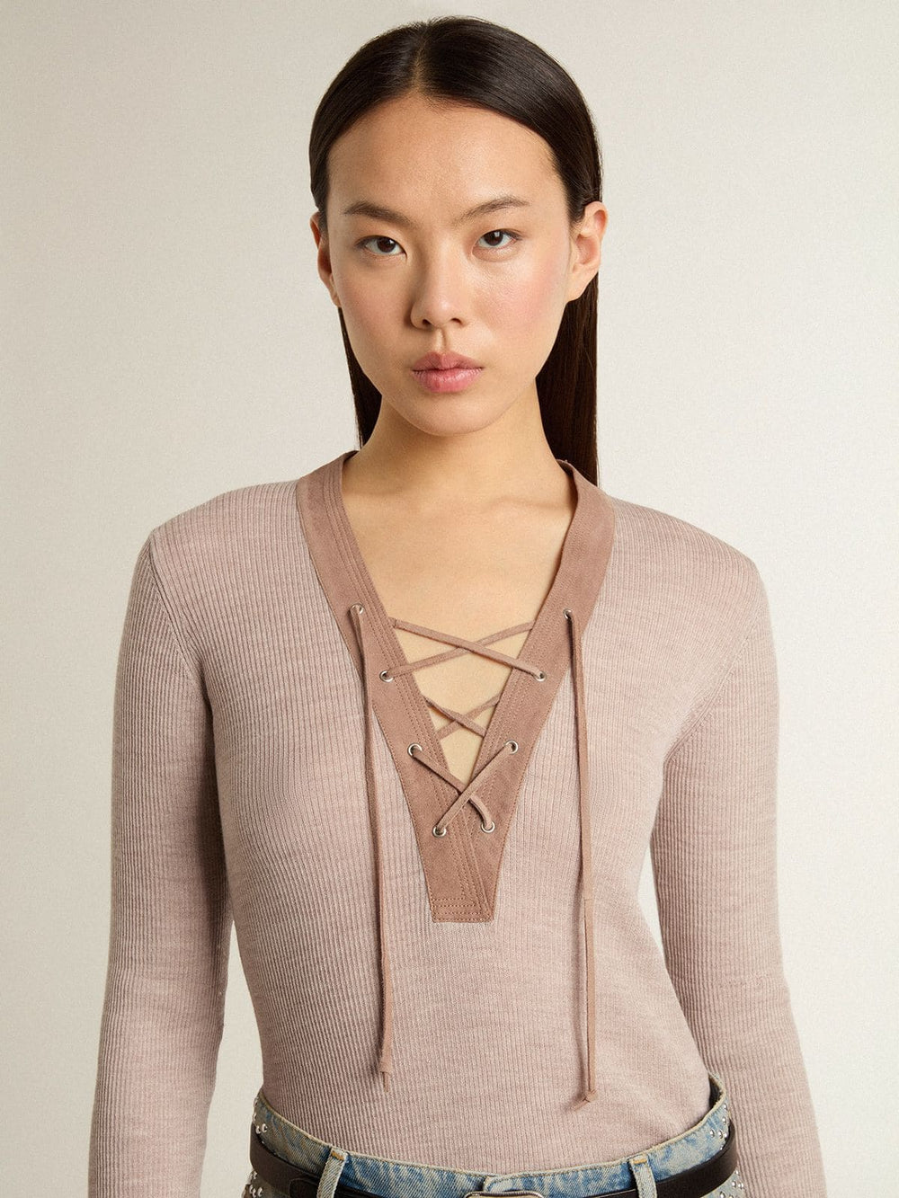 Beige wool sweater with leather details