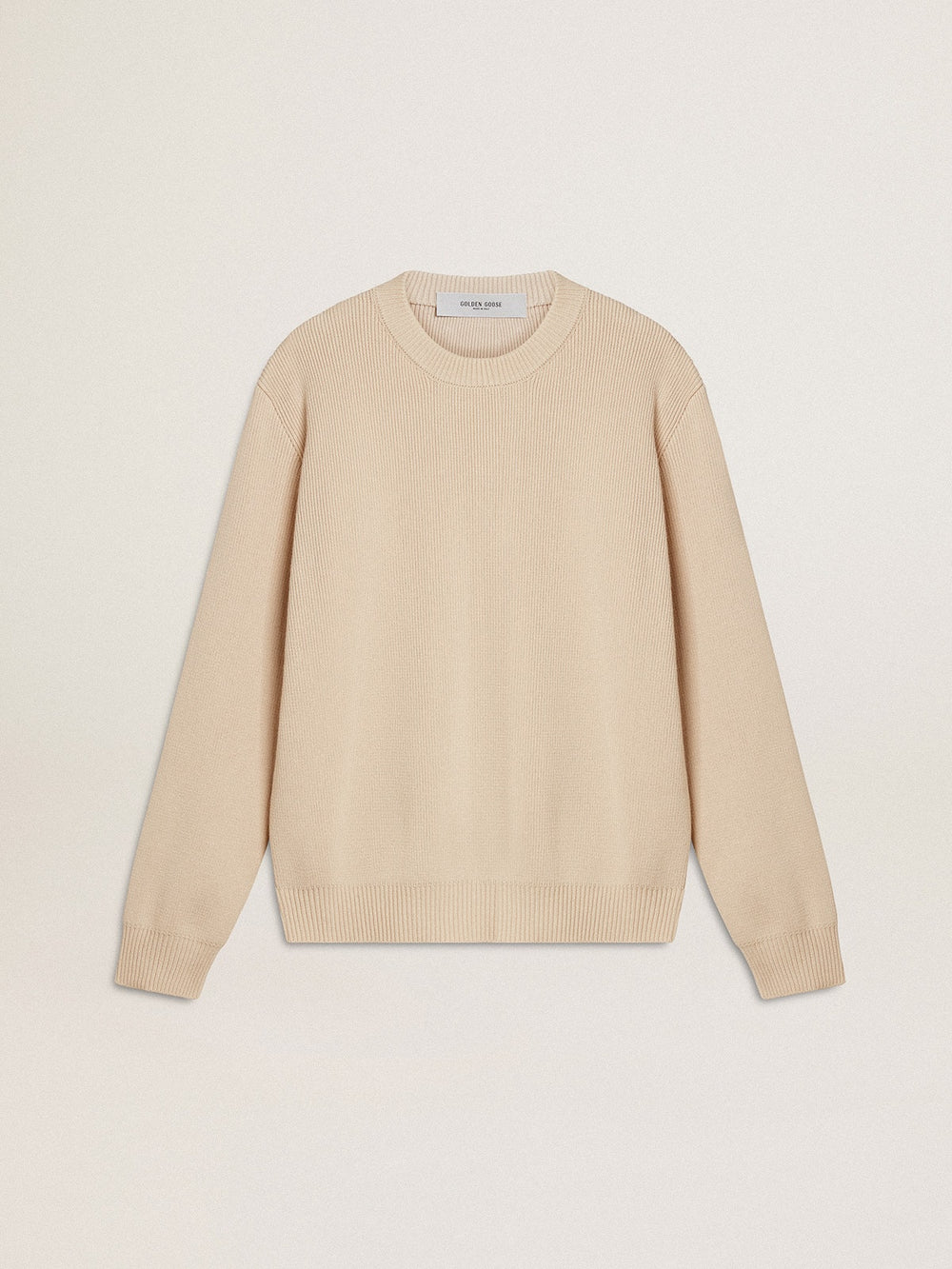 Women's beige sweater with 'Golden' lettering on the back