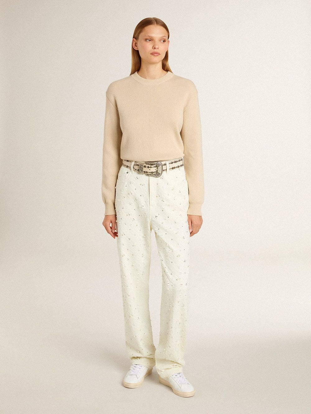 Women's beige sweater with 'Golden' lettering on the back