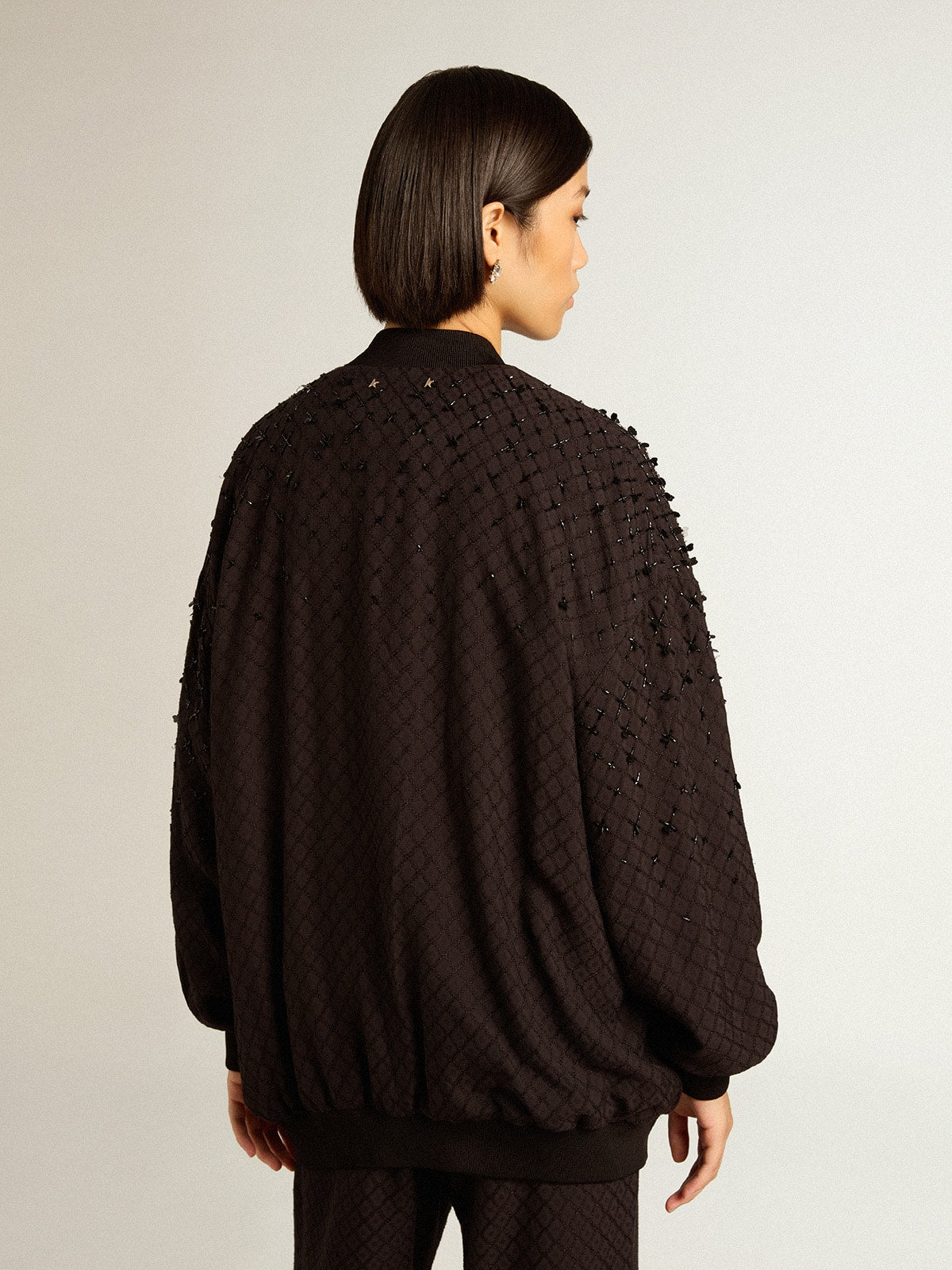Women’s black cardigan with shaded embroidery