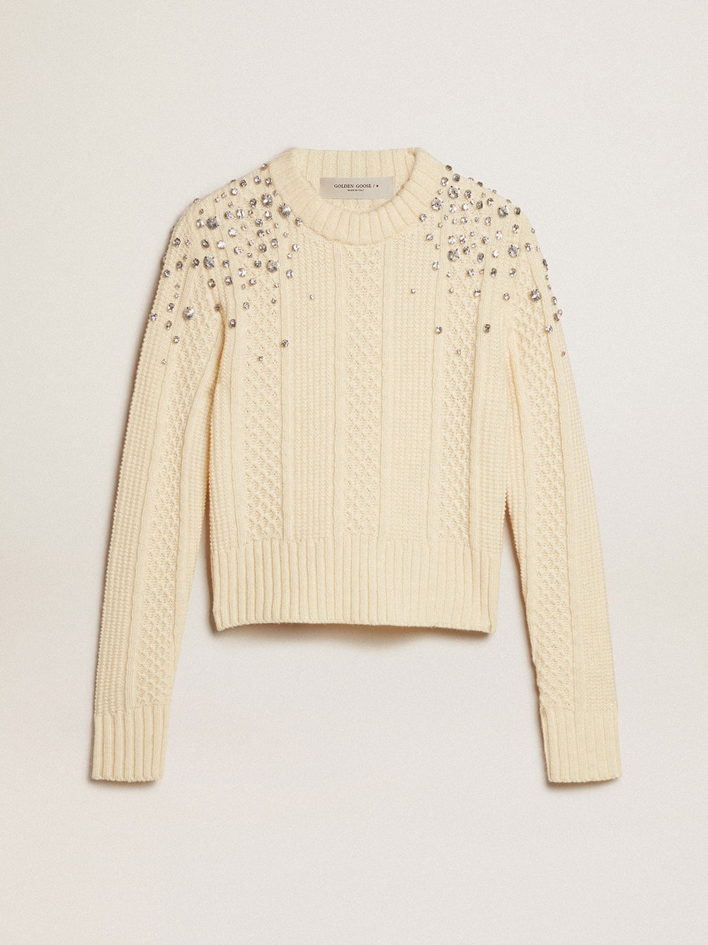 Women's cropped worn-white sweater with decorative crystals