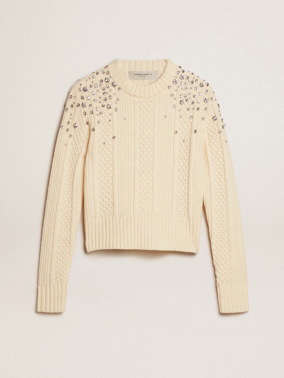 Women's cropped worn-white sweater with decorative crystals