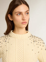 Women's cropped worn-white sweater with decorative crystals