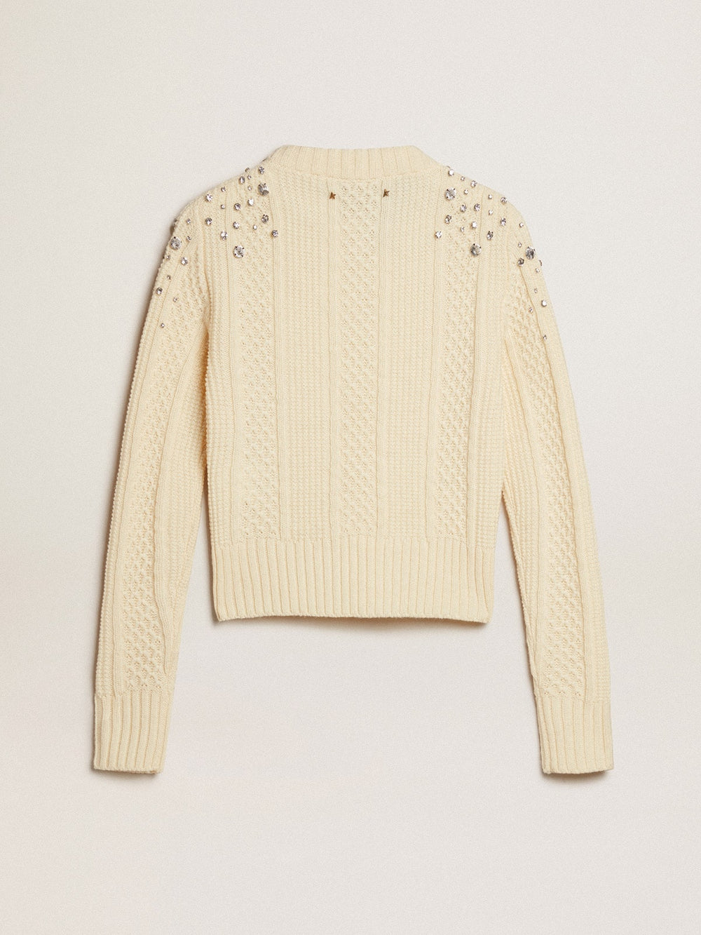 Women's cropped worn-white sweater with decorative crystals