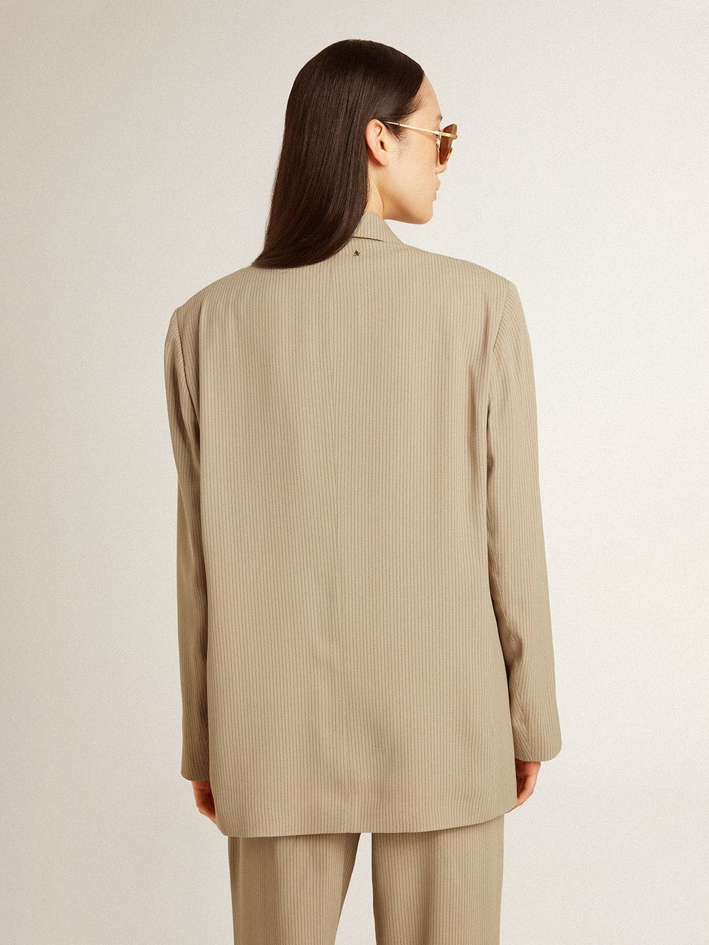 Women's beige pinstripe single-breasted jacket with an oversized fit