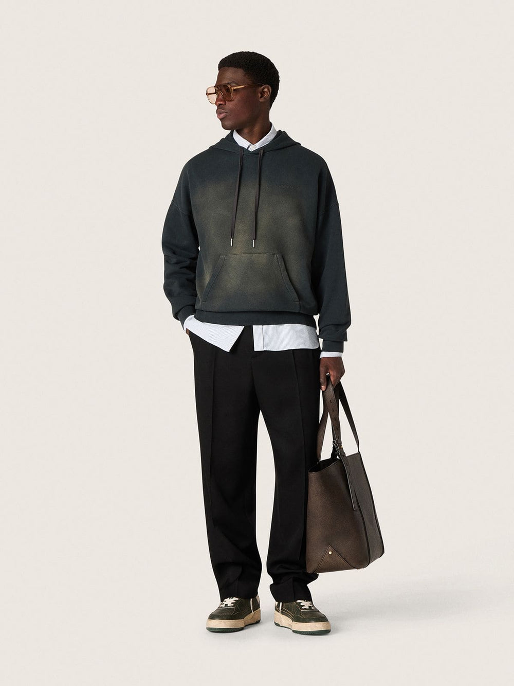 Unisex hooded sweatshirt in black cotton with a bleached effect