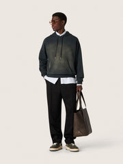 Unisex hooded sweatshirt in black cotton with a bleached effect