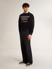 Black crew neck sweatshirt with embroidered lettering
