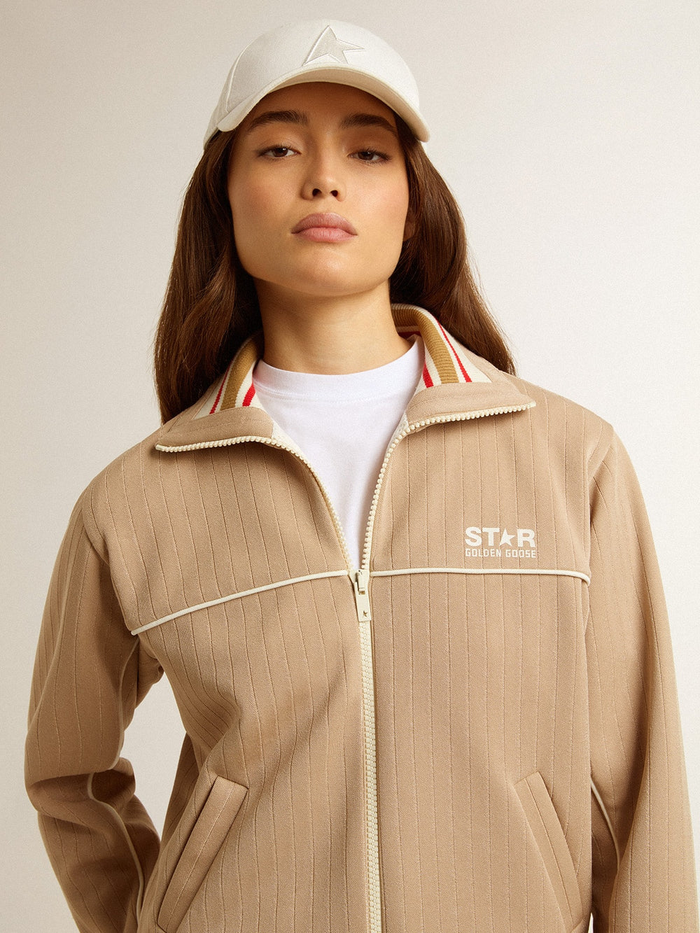Women’s light beige zipped sweatshirt with white logo