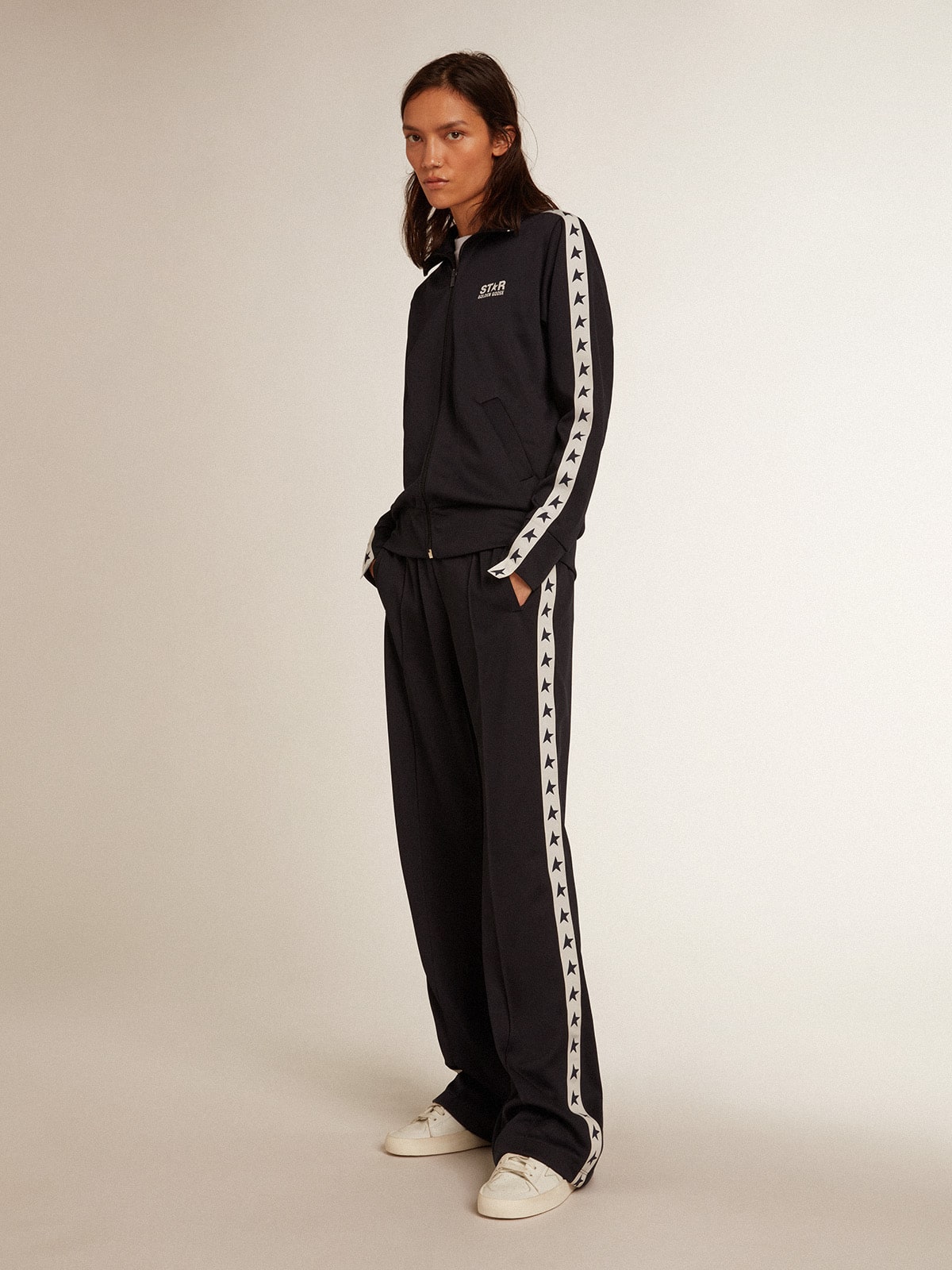 Dark blue zipped sweatshirt with white strip and contrasting stars