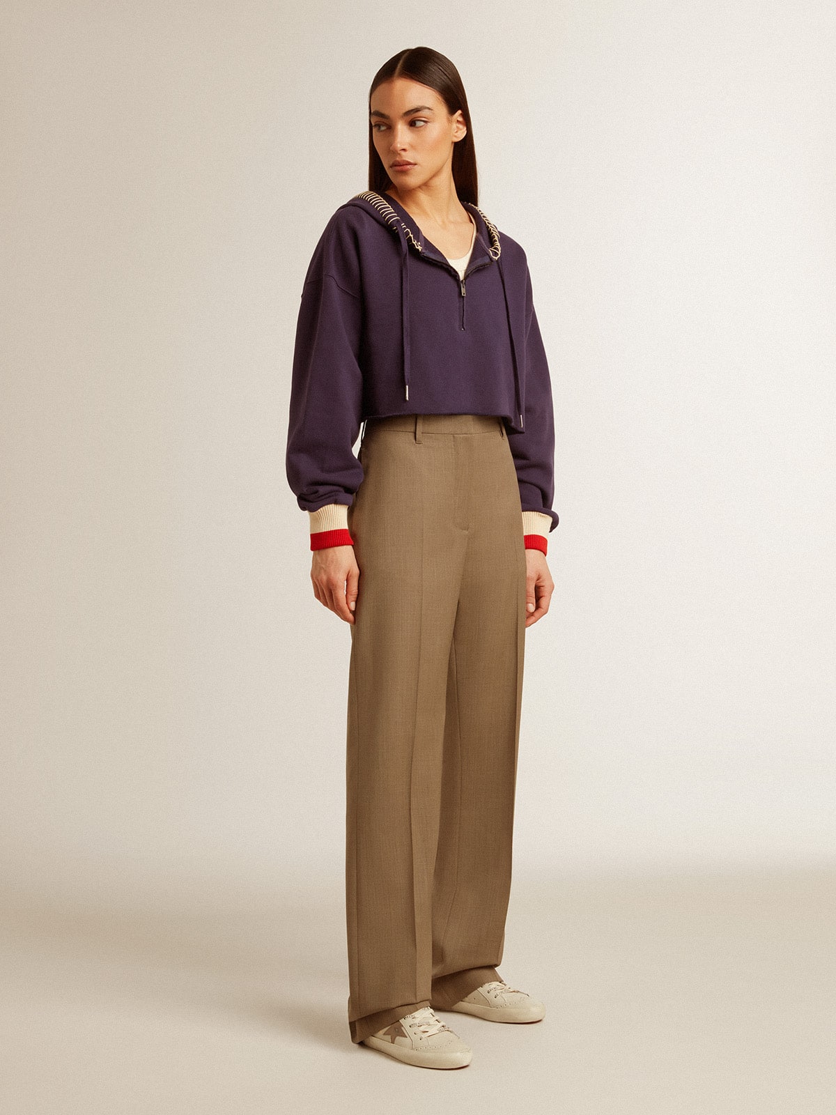 Dark blue cropped sweatshirt with zip fastening and embroidered hood