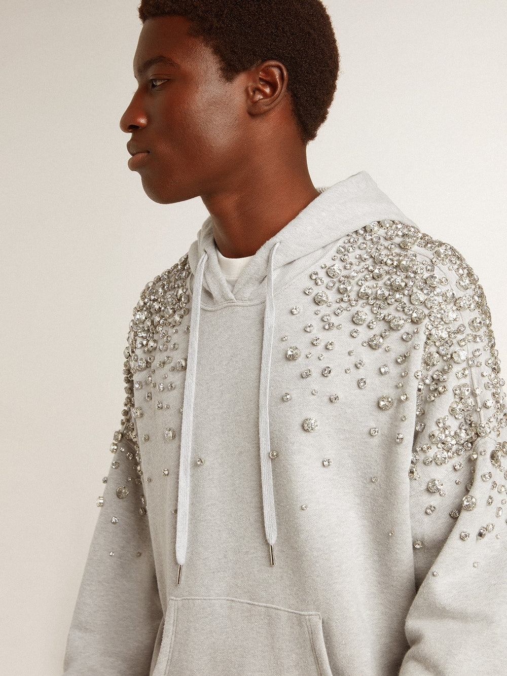 Gray hooded sweatshirt with crystal decoration
